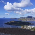 Panorama di Filicudi, isola eolica con case tradizionali e mare cristallino.